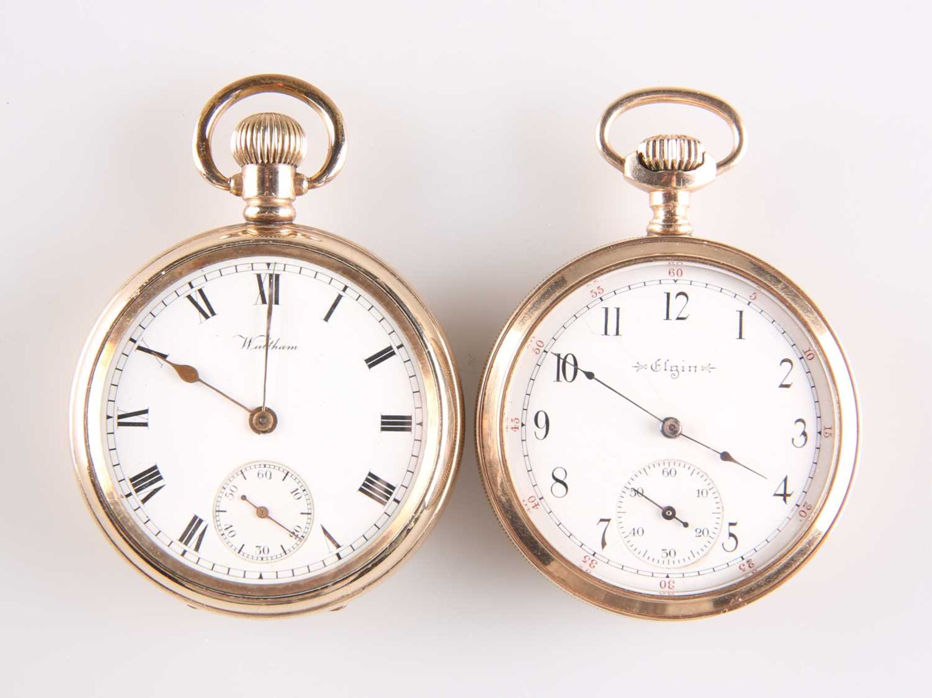 TWO GOLD-FILLED POCKET WATCHES BY WALTHAM & ELGIN