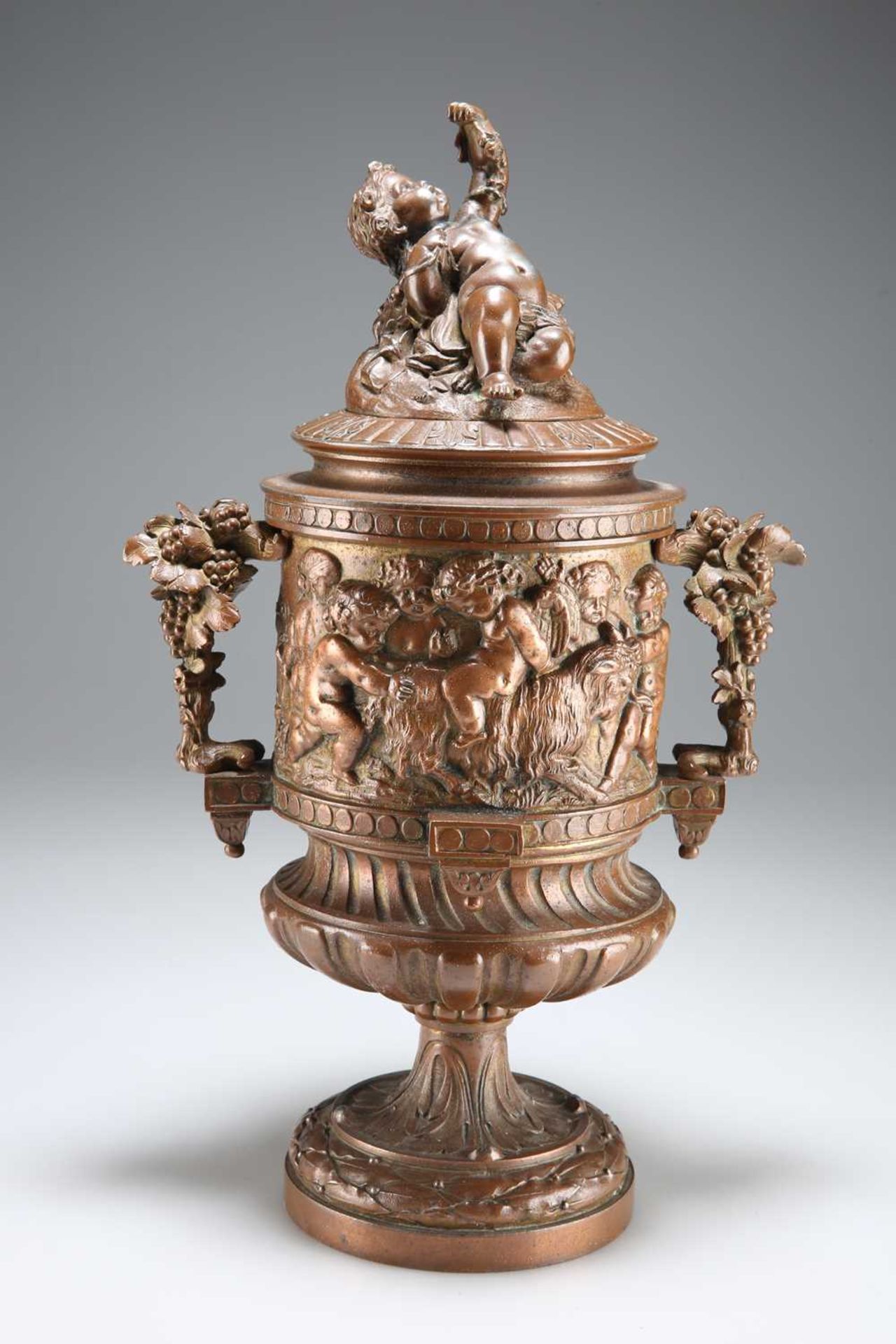 A LATE 19TH CENTURY FRENCH BRONZE URN, IN THE MANNER OF CLODION