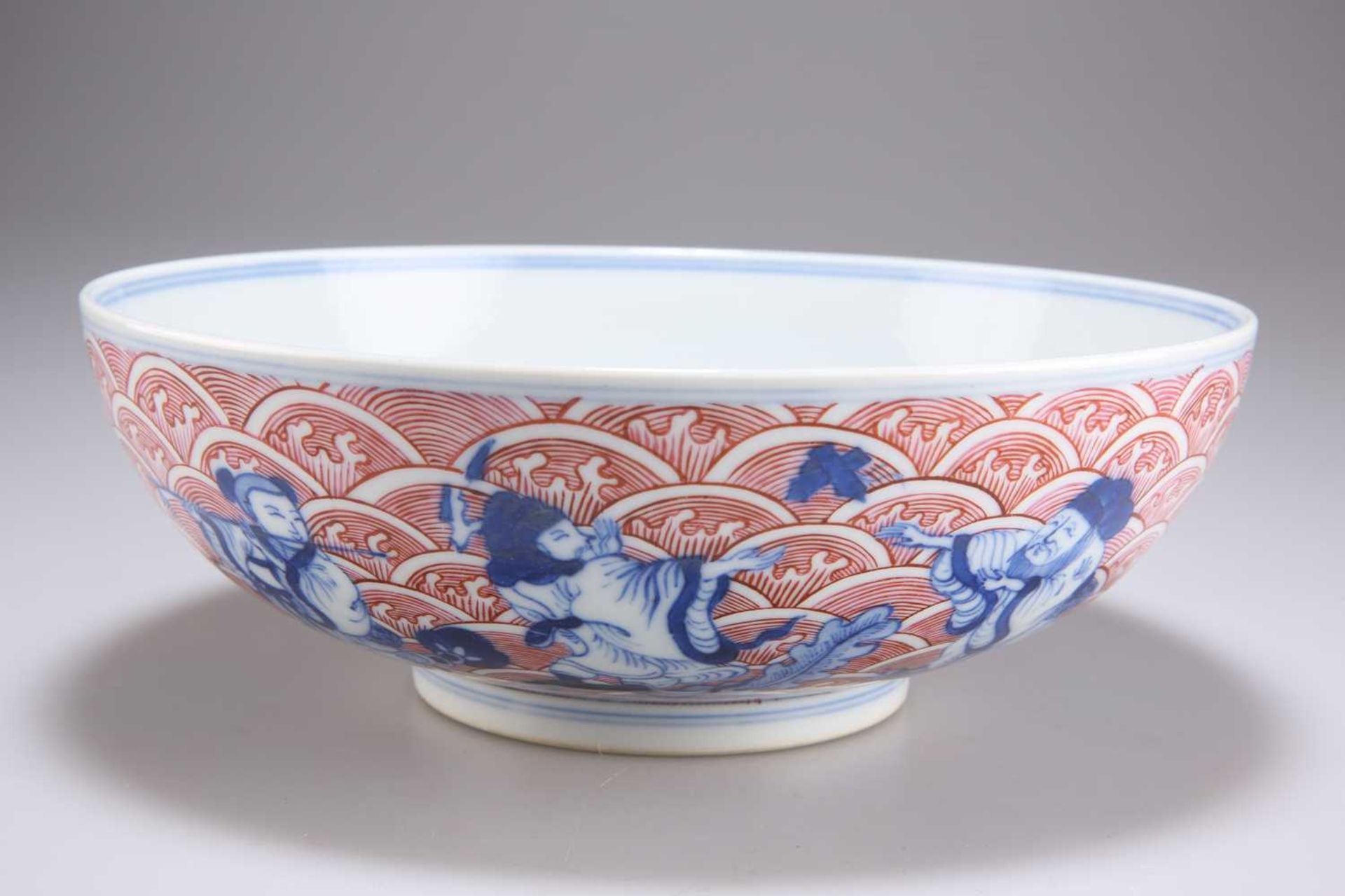 A CHINESE PUCE-ENAMELLED BLUE AND WHITE BOWL