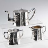 A CHINESE EXPORT SILVER THREE-PIECE TEA SERVICE