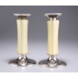 A PAIR OF SWISS STERLING SILVER AND ENAMEL CANDLESTICKS