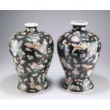 A PAIR OF CHINESE FAMILLE NOIR VASES