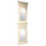 A PAIR OF WHITE-PAINTED COMPOSITION PIER MIRRORS