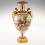 A ROYAL WORCESTER TWO-HANDLED VASE