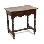 A PRIMITIVE 18TH CENTURY OAK AND PINE SIDE TABLE