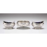 A GEORGE III SILVER SALT AND A PAIR OF GEORGE V SILVER SALTS