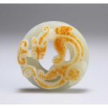 A CHINESE CARVED JADE DISC