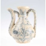 A SMALL CHINESE BLUE AND WHITE CRACKLE GLAZE EWER