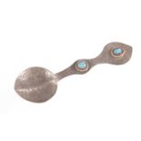 A TIBETAN WHITE METAL MEDICINE SPOON