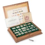 THE STAMPS OF ROYALTY, A CASED SET OF TWENTY-FIVE STERLING SILVER STAMPS