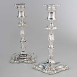 A PAIR OF 18TH CENTURY STYLE SILVER-PLATED CANDLESTICKS