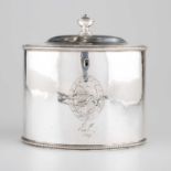 A GEORGE III SILVER TEA CADDY