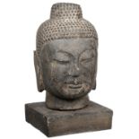 A CHINESE CARVED STONE BUDDHA'S HEAD