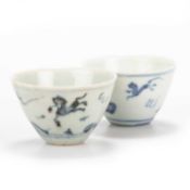 A PAIR OF SMALL CHINESE BLUE AND WHITE FLYING HORSES WINE CUPS, MING 16TH CENTURY
