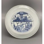 A CHINESE BLUE AND WHITE LANDSCAPE DISH, WANLI (1572-1620)