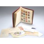 A STANLEY GIBBONS MINOR STAMP ALBUM