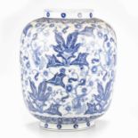 A CHINESE BLUE AND WHITE LANTERN-SHAPED VASE