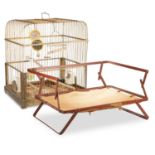 A 20TH CENTURY BIRD CAGE AND TRAVEL DOG BED