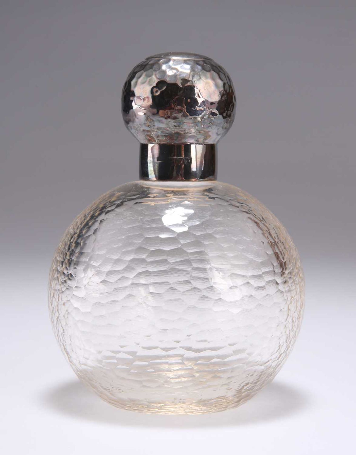 AN EDWARDIAN SILVER-MOUNTED GLASS SCENT BOTTLE