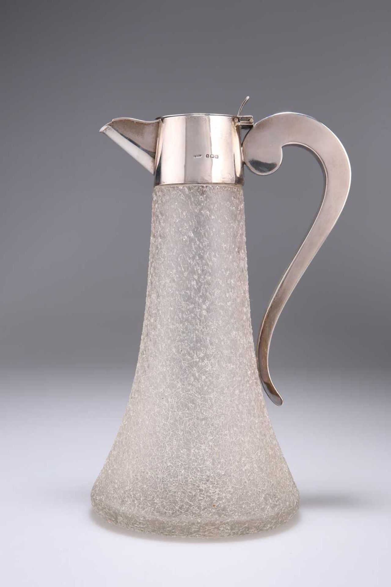 A GEORGE V SILVER-MOUNTED CLARET JUG