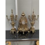 A LARGE PERIOD STYLE BRASS CLOCK GARNITURE