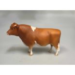 A BESWICK MODEL OF A GUERNSEY BULL