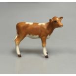 A BESWICK MODEL OF A GUERNSEY CALF