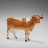 A BESWICK MODEL OF A GUERNSEY COW