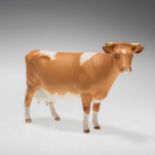 A BESWICK MODEL OF A GUERNSEY COW