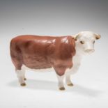 A BESWICK MODEL OF A HEREFORD COW