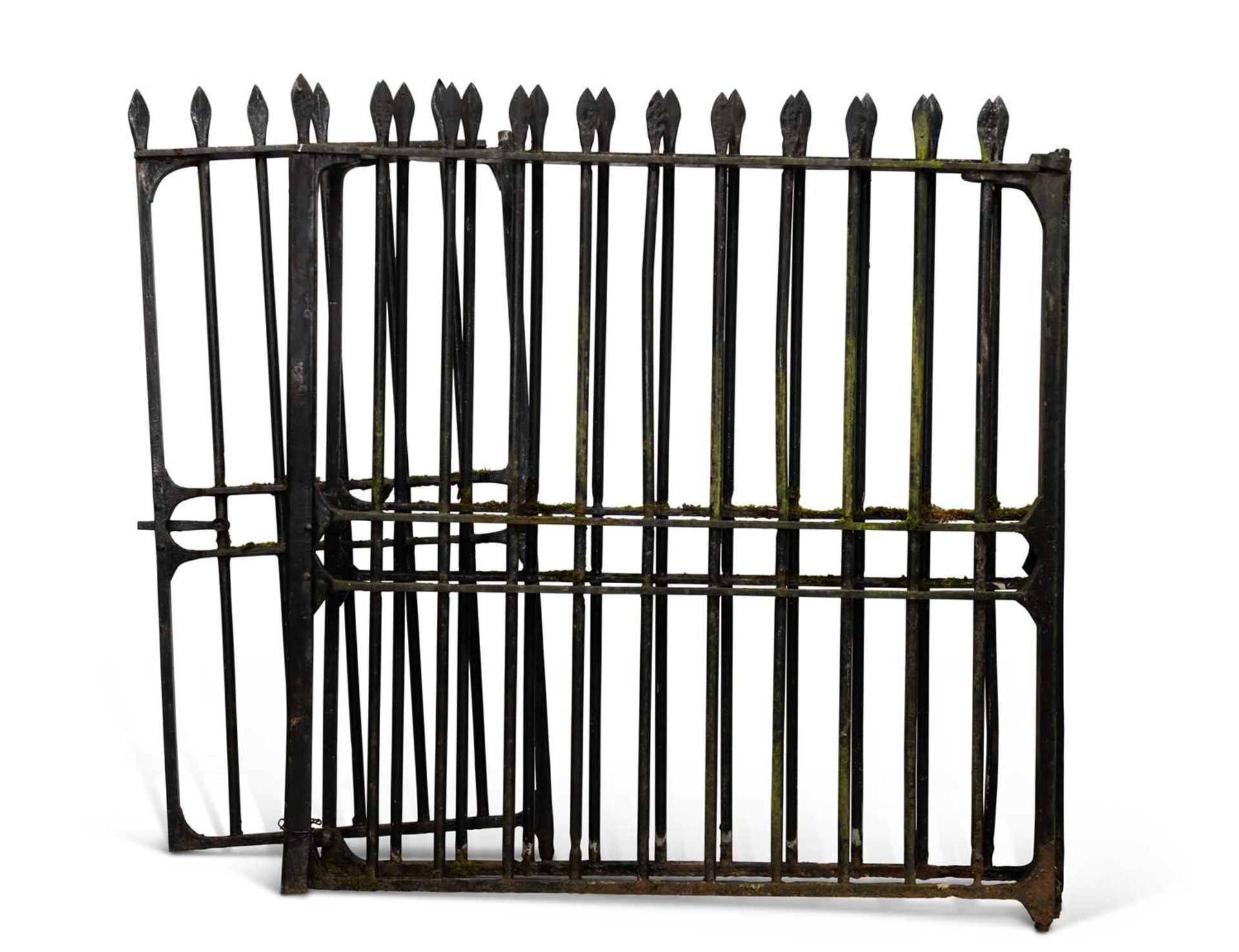 A LARGE PAIR OF CAST IRON GATES AND A SMALLER GATE EN SUITE