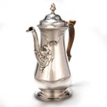 AN EARLY GEORGE III SILVER COFFEE POT