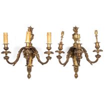 A PAIR OF LOUIS XVI STYLE ORMOLU THREE-LIGHT WALL SCONCES, 19TH CENTURY