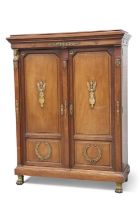 AN EMPIRE STYLE ORMOLU-MOUNTED WALNUT LIBRARY CABINET, 19TH CENTURY