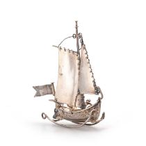 A GERMAN SILVER MINIATURE OF A BOAT
