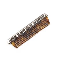 AN EDWARDIAN SILVER-MOUNTED MOUSTACHE COMB