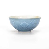 A CHINESE MOULDED MONOCHROME BOWL