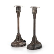 A PAIR OF SECESSIONIST SILVERED METAL CANDLESTICKS