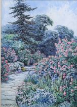 LILIAN STANNARD (1877-1944) THE RHODODENDRON WALK IN AN OLD GARDEN IN BEDFORDSHIRE