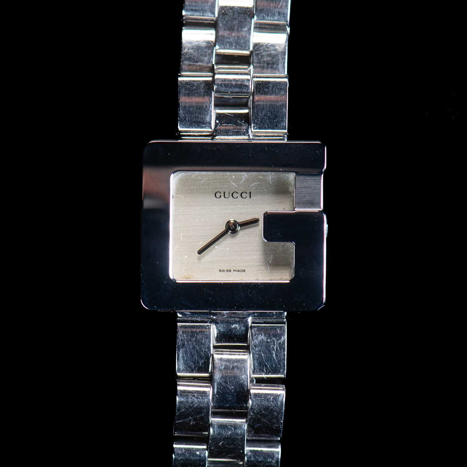 A LADY'S STEEL GUCCI "G" BRACELET WATCH