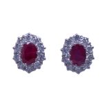 18CT YELLOW AND WHITE GOLD, RUBY AND DIAMOND CLUSTER STUD EARRINGS.