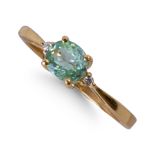 18CT YELLOW GOLD LIGHT GREEN STONE AND DIAMOND CLUSTER RING.