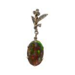 A BLACK OPAL AND ROSE CUT DIAMOND PENDANT.