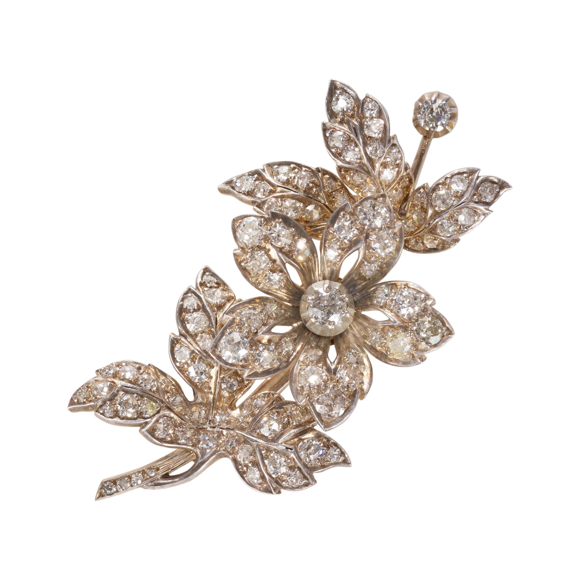 AN ANTIQUE OLD CUT DIAMOND EN TREMBLANT FLORAL SPRAY BROOC, IN YELLOW GOLD AND SILVER.