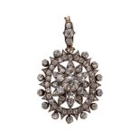 AN ANTIQUE VICTORIAN OLD CUT DIAMOND PENDANT BROOCH.