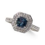 A SAPPHIRE AND DOUBLE ROW DIAMOND DIAMOND CLUSTER RING, IN PLATINUM MOUNT.