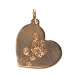 A TIFFANY AND CO, 18CT GOLD SOLID HEART PENDANT WITH ENGRAVED ROSE.