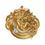 A FRENCH ART NOUVEAU GOLD BROOCH SET WITH DIAMONDS.