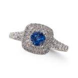 A SAPPHIRE AND DOUBLE ROW DIAMOND CLUSTER RING, IN PLATINUM MOUNT.