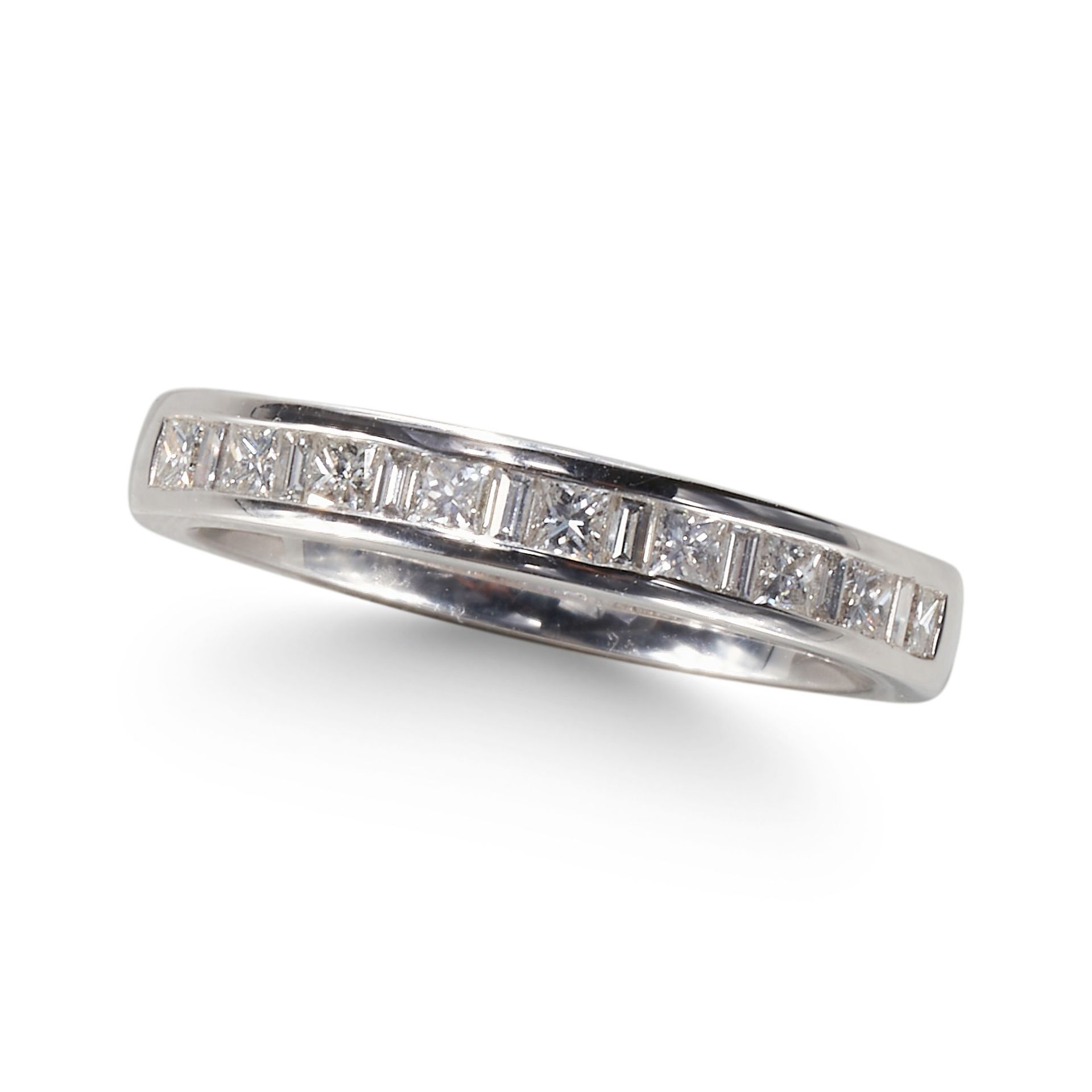 A PRINCESS AND EMERALD CUT DIAMONDS HALF ETERNITY RING, IN PLATINUM MOUNT.